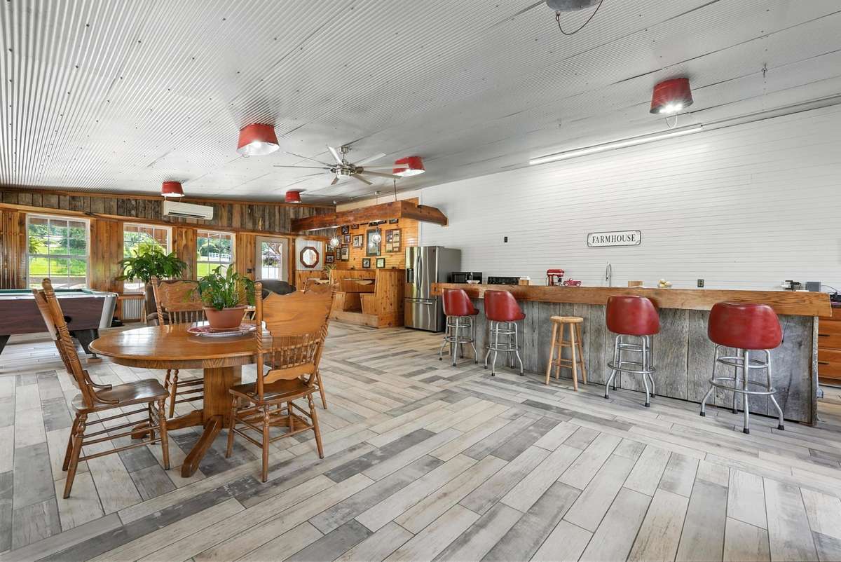 It doesn't have to be a holiday to have a gathering . Another cooking area .