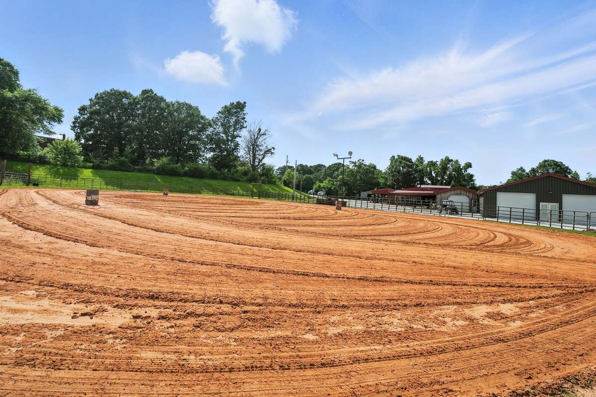 I cannot tell you how many loads of sand that has been hauled in to create this ground .