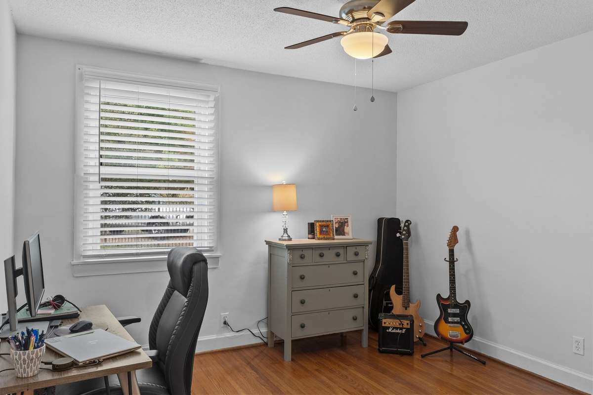 Bedroom #1- considered the Primary Bedroom because a full bathroom with another closet is attached to this room- seller is using it as an office