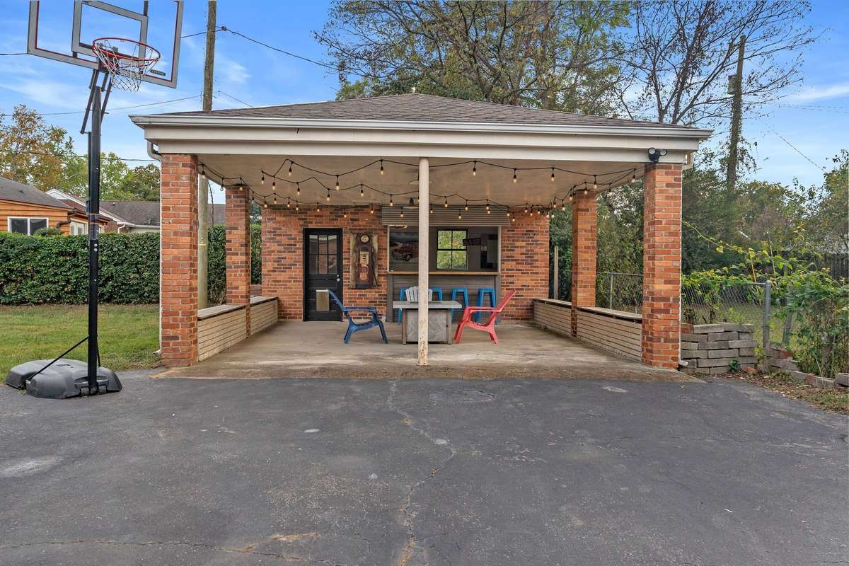 Exterior Carport currently being used as the outdoor entertainment area!