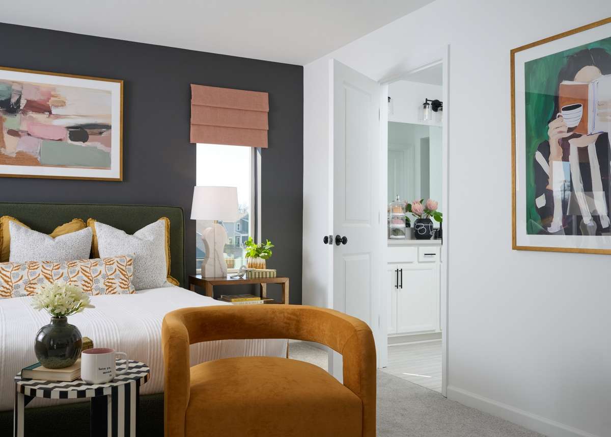 Owner's retreat opens to a private, oversized bathroom. Photo of our furnished model home - colors may vary, see sales for specifics