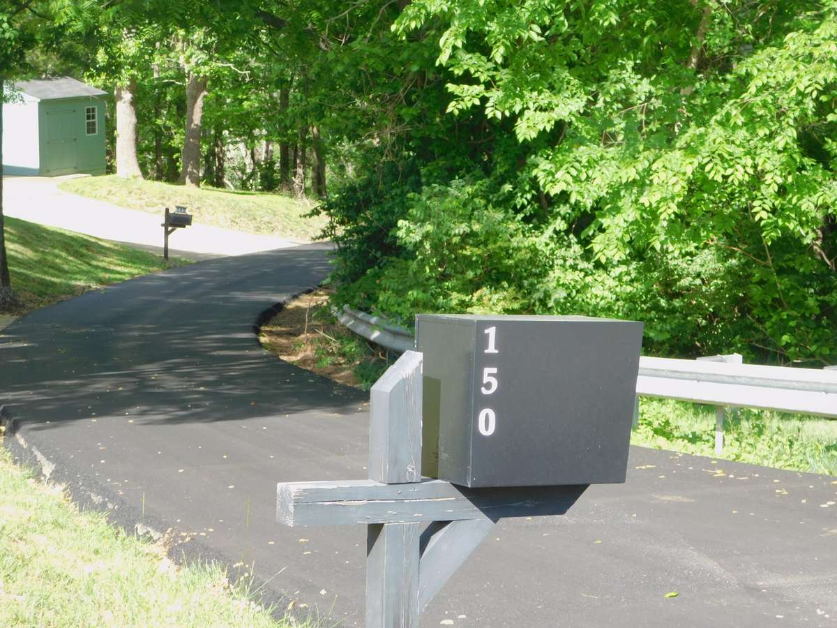 A newly Paved Street for the few Homes located on a Singular Stretch with City Sewer- 
Hidden secluded Gem surrounded by Exceptional Sites