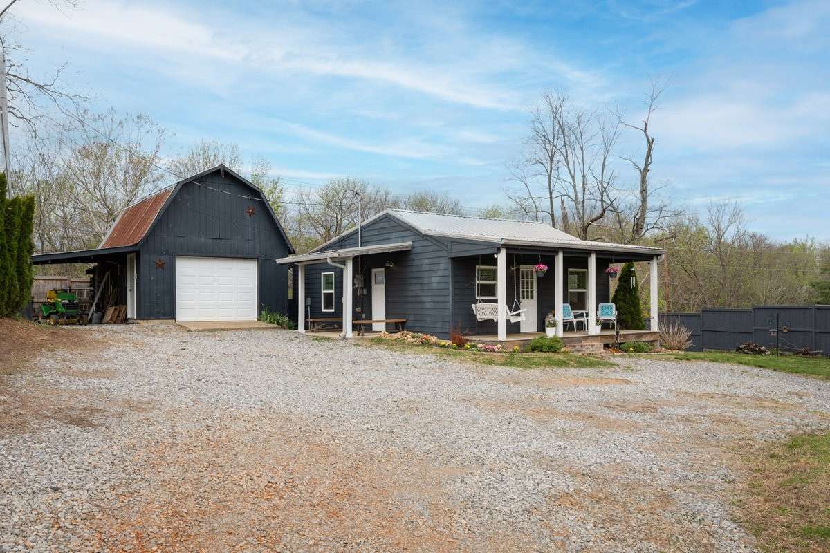 Detached Garage doubles as a Work Shop, Storage, Workout Space, with area for Mowers