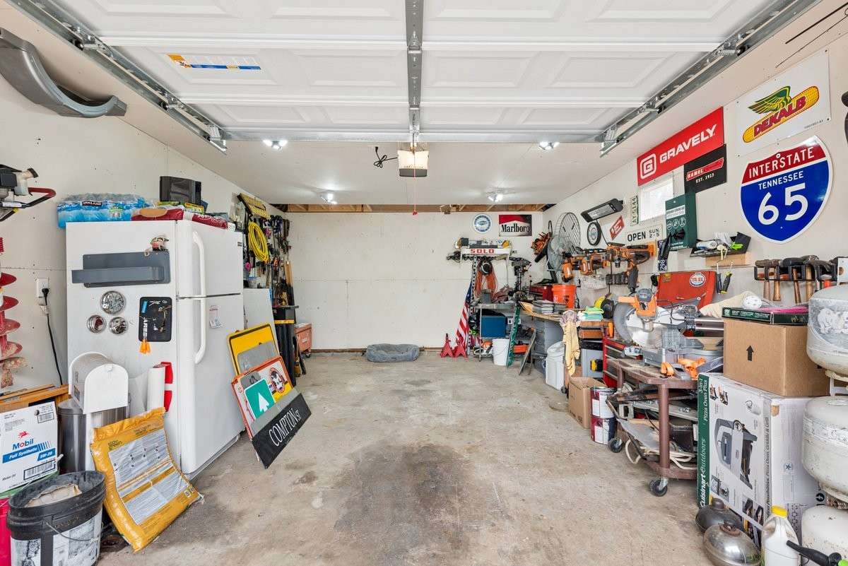 Many Options for the detached Garage space- Ideas abound for parking, studio, Man Cave
  or workshop..Pedestrian doorway and remote for Garage Door