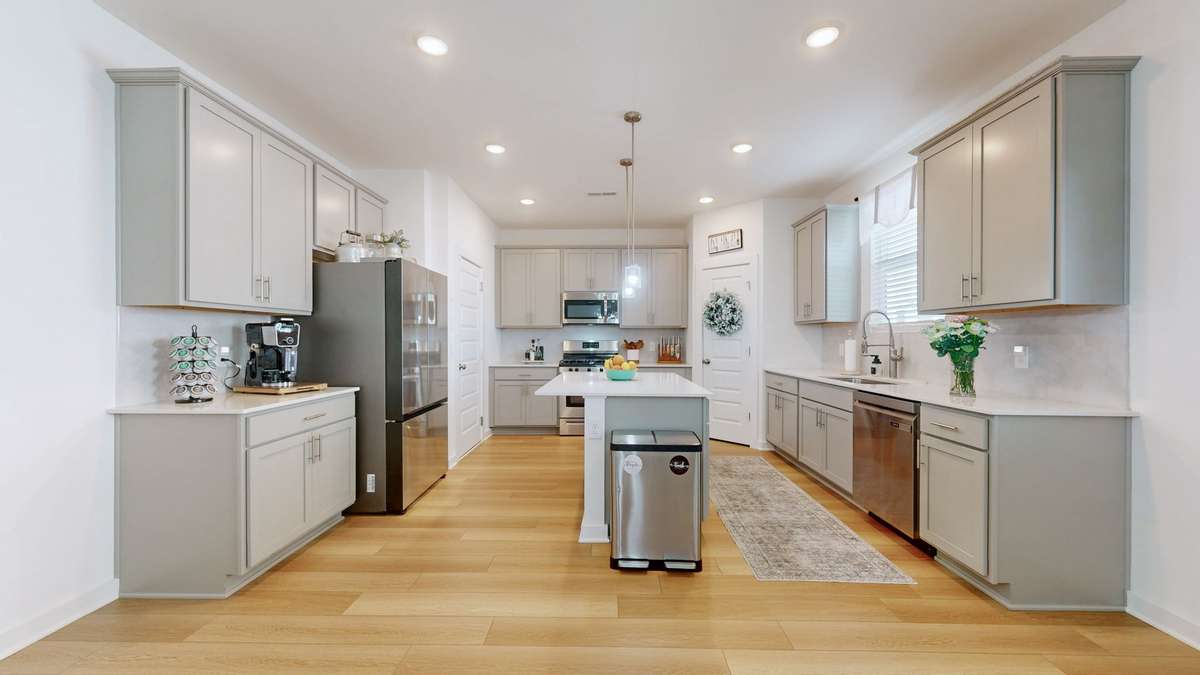 Spacious kitchen with lots of storage and upgraded dishwasher