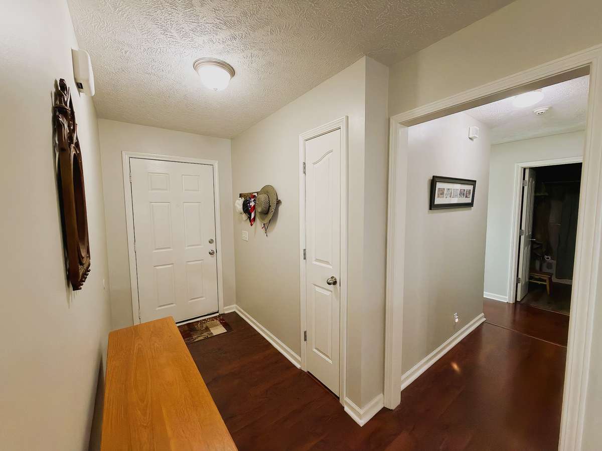 Entry Foyer opens up to great room and hallway to bedrooms