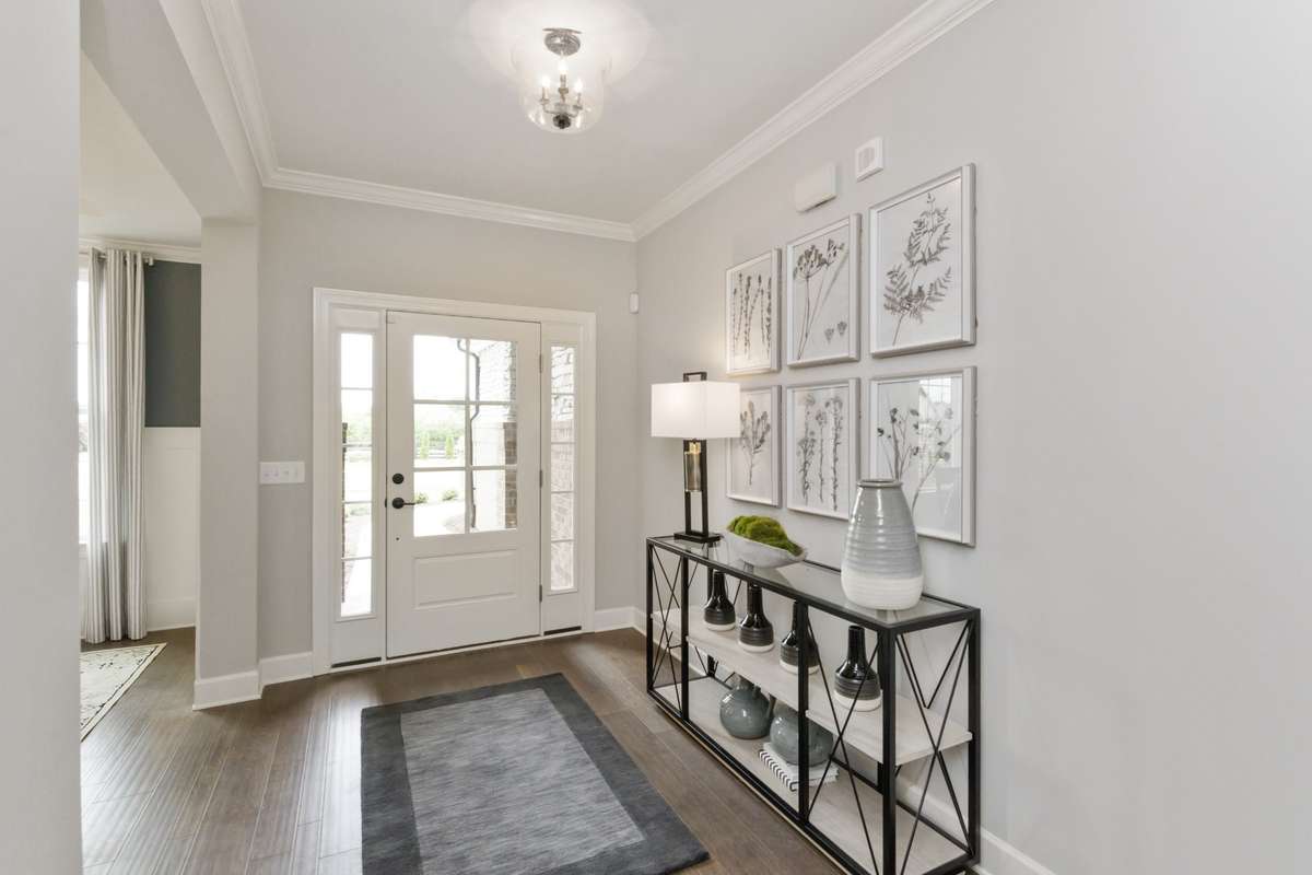 Photos are of the model home. Listing is for a to be built home. Extra Wide Foyer-right into your office space.