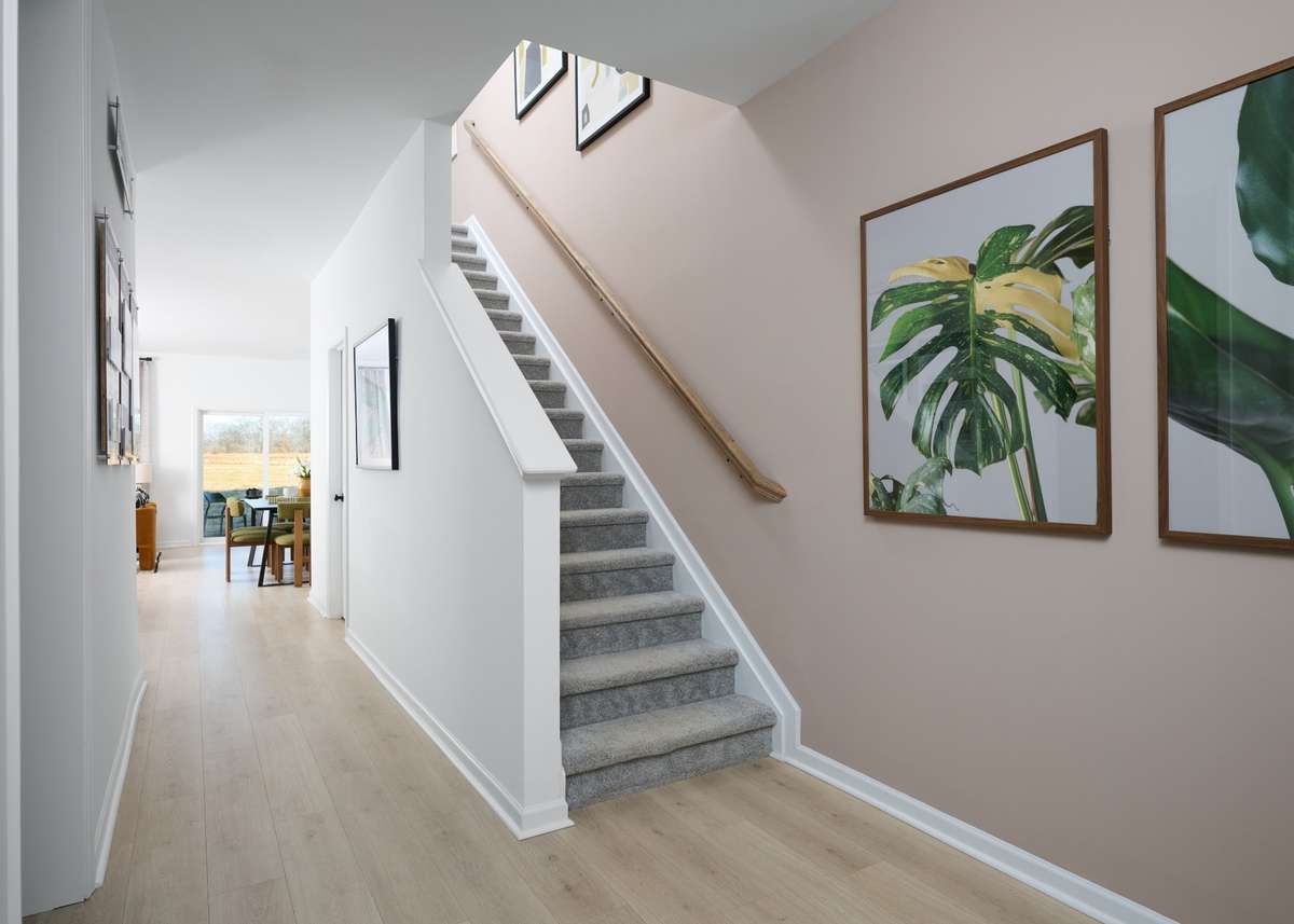 Open concept from the front door all the way to the back of the home. Photo is of the same floorplan but is the furnished model. Design options may change- see sales for specifics.