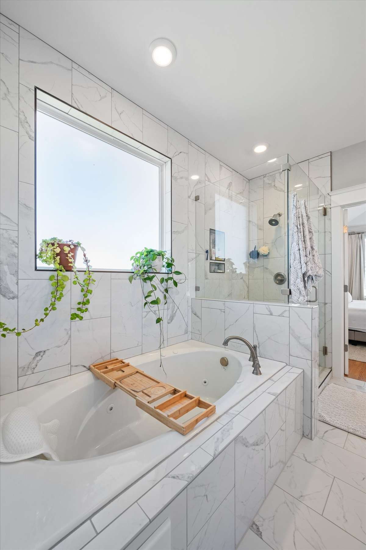 Separate tub and walk-in shower.