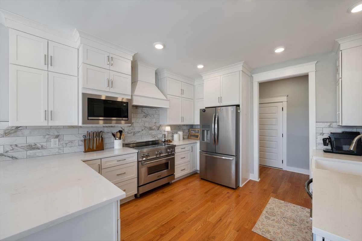 Look at the counter space and cabinets that run to the ceiling.