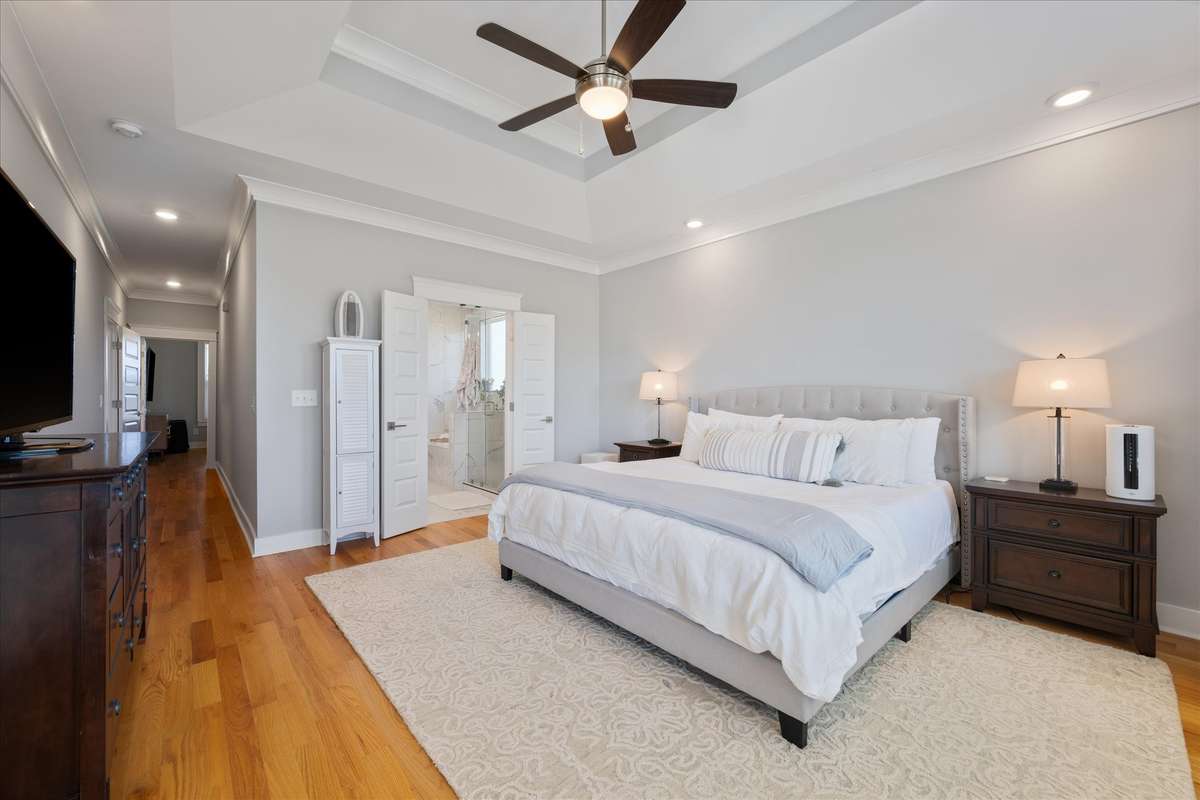 The primary suite has a privacy door just down the hall.