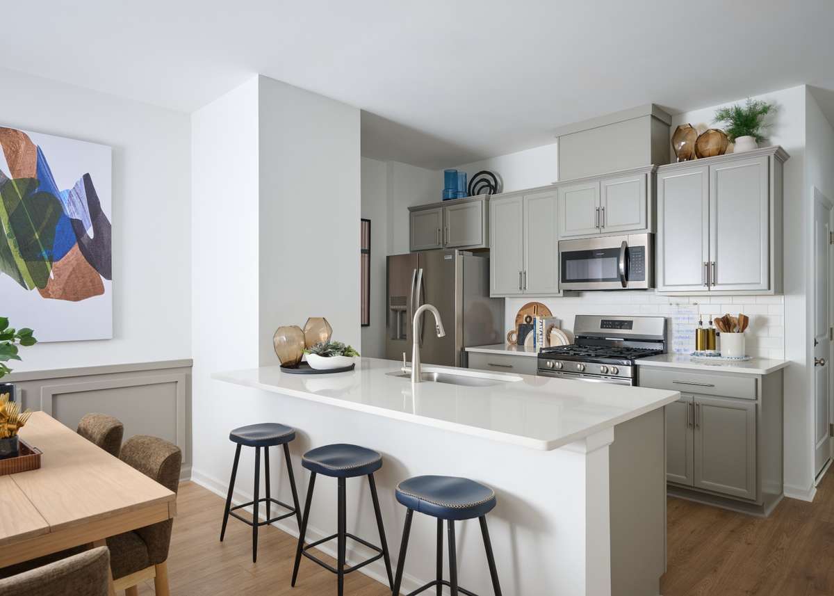 Kitchen overlooks the gathering room- perfect for all occasions. Photo is of the same floorplan but is the furnished model. Design options may change - See sales for specifics