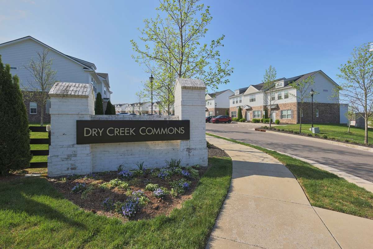 One of two entrances to Dry Creek Commons: a sidewalk small community close to restaurants, shopping, freeways, and parks.