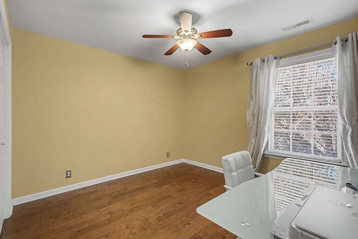 The two secondary bedrooms are good sized and have wood flooring.