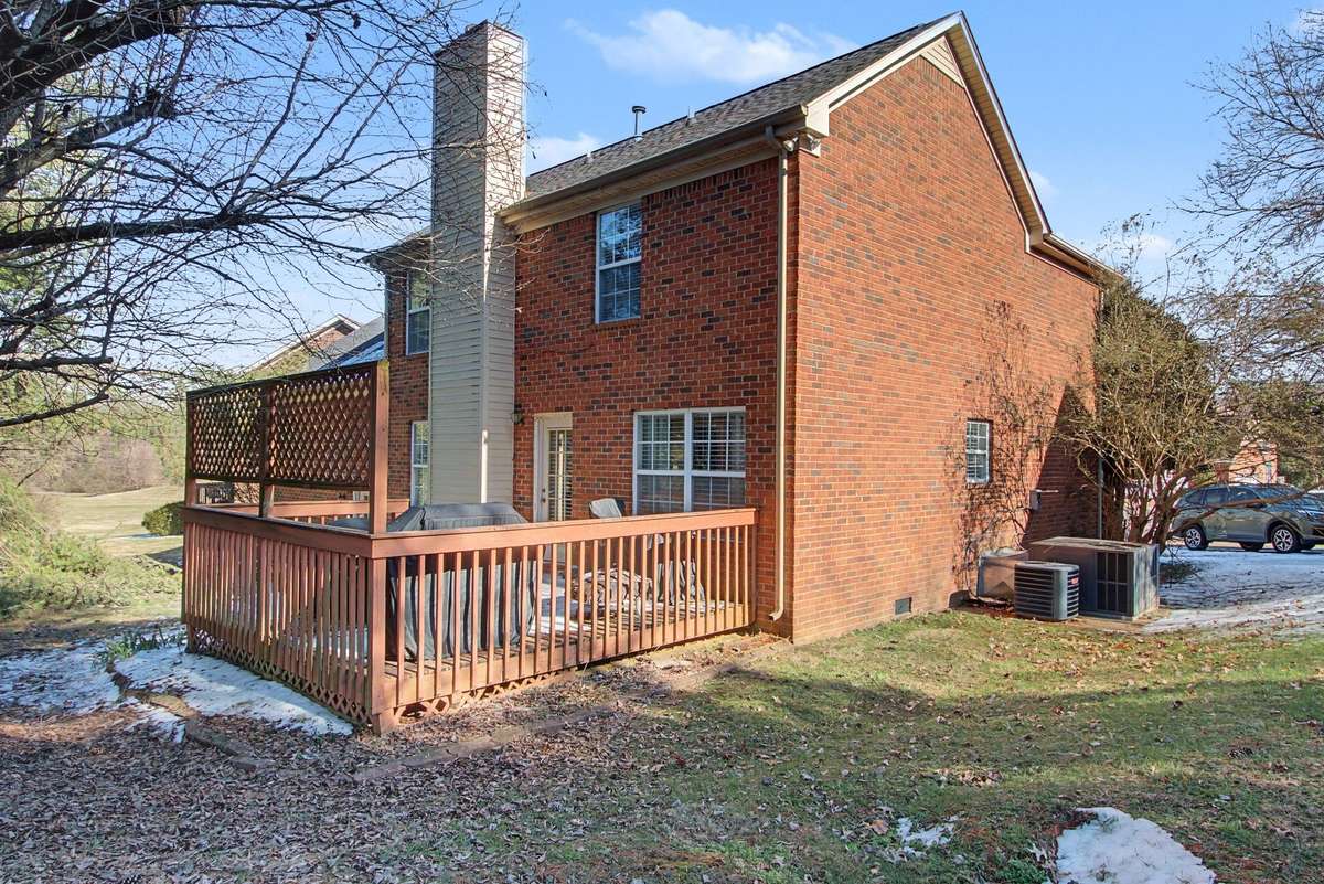 Nice private deck on the back and level yard is low maintenance.