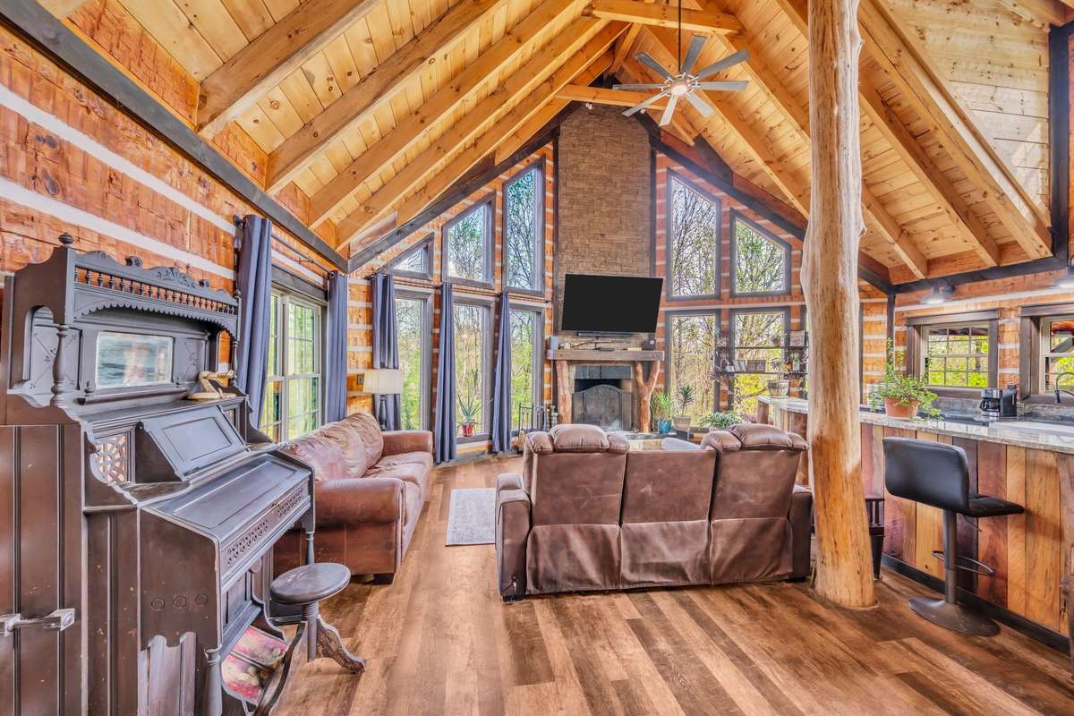 Floor to ceiling custome designed wood burning fireplace.