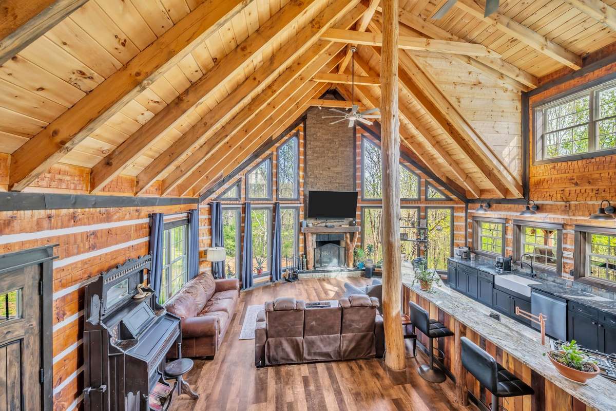 The living room bosts 22 ft soaring ceilings!