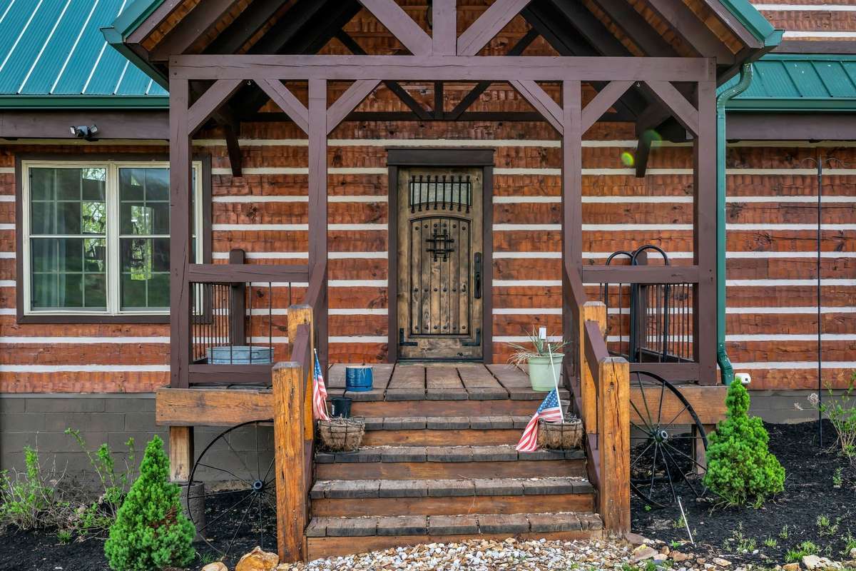 Beautiful custom from porch to greet your guests in this dream home!