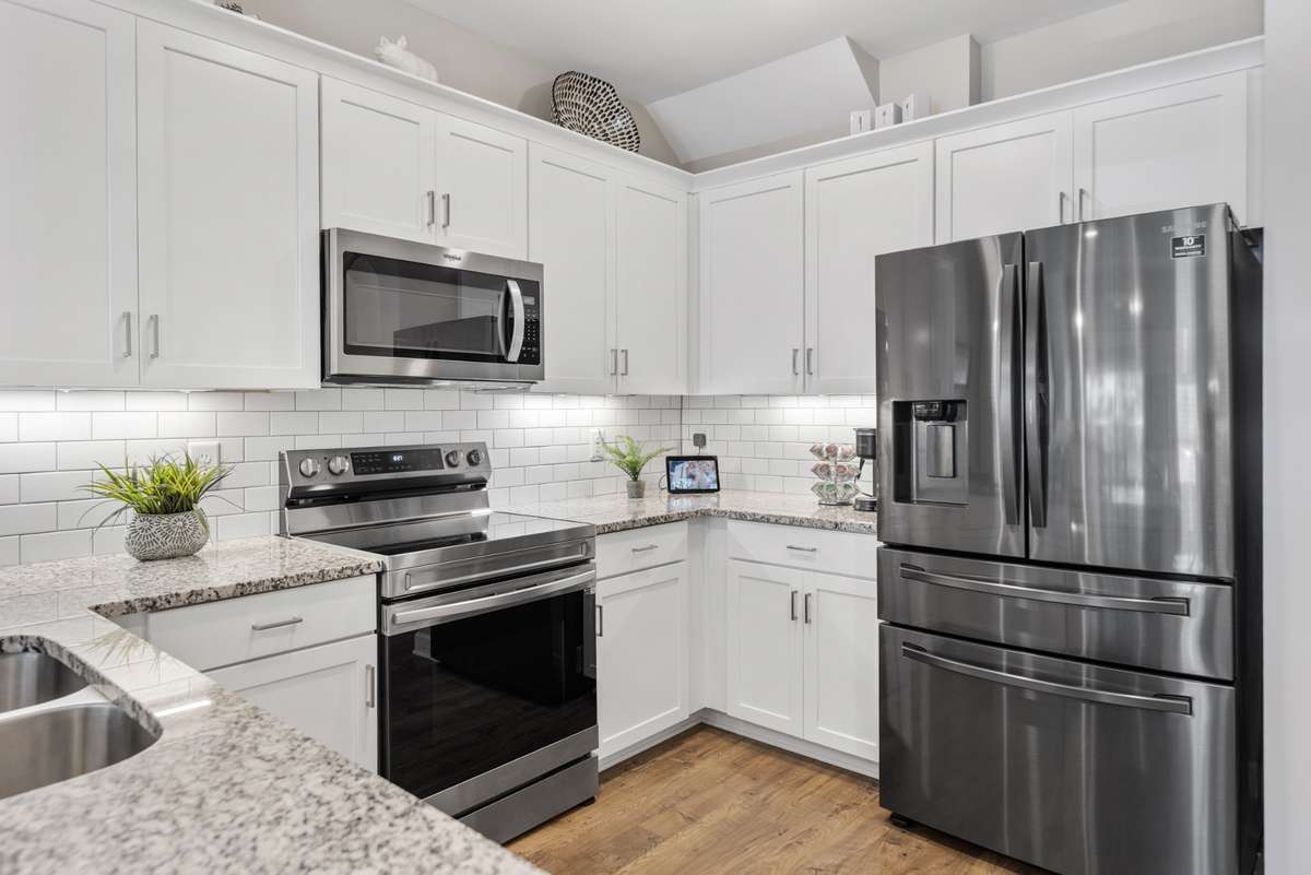 This well appointed chef's kitchen comes with everything you need,even this entertainer's refrigerator.