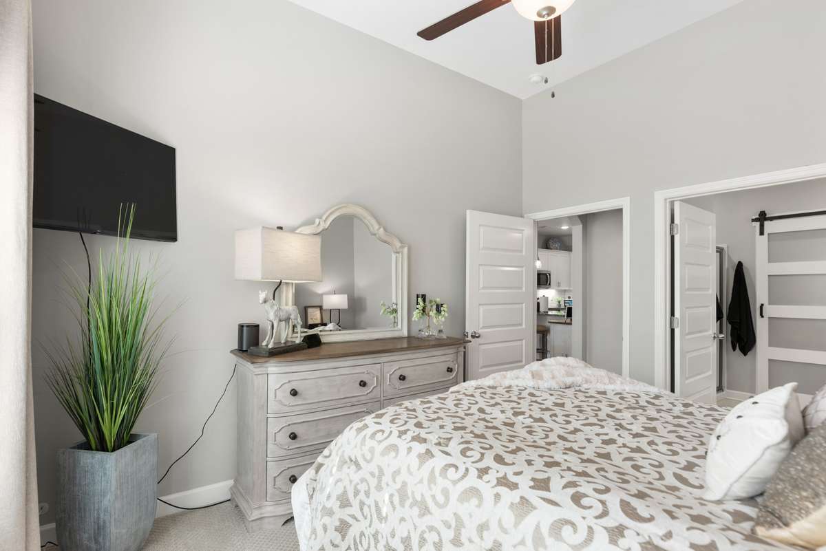 The flat screen TV will also remain in the primary suite on the main floor with access to the private full bath.