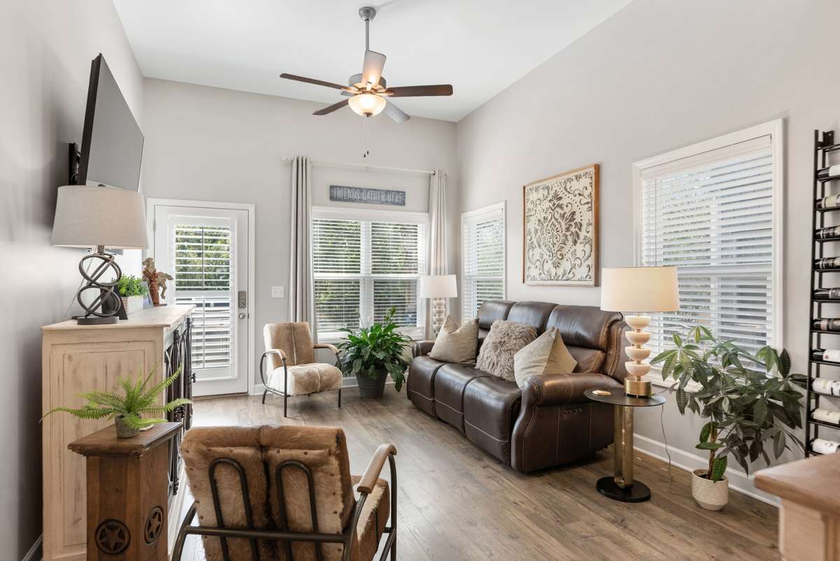 This one is better than new!  The end unit has tons of natural light with the blinds & draperies already in place.