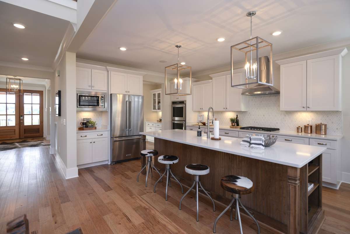 Photos are from another home with the same plan and are for representative purposes only.  Exterior and interior selections and upgrades may vary.