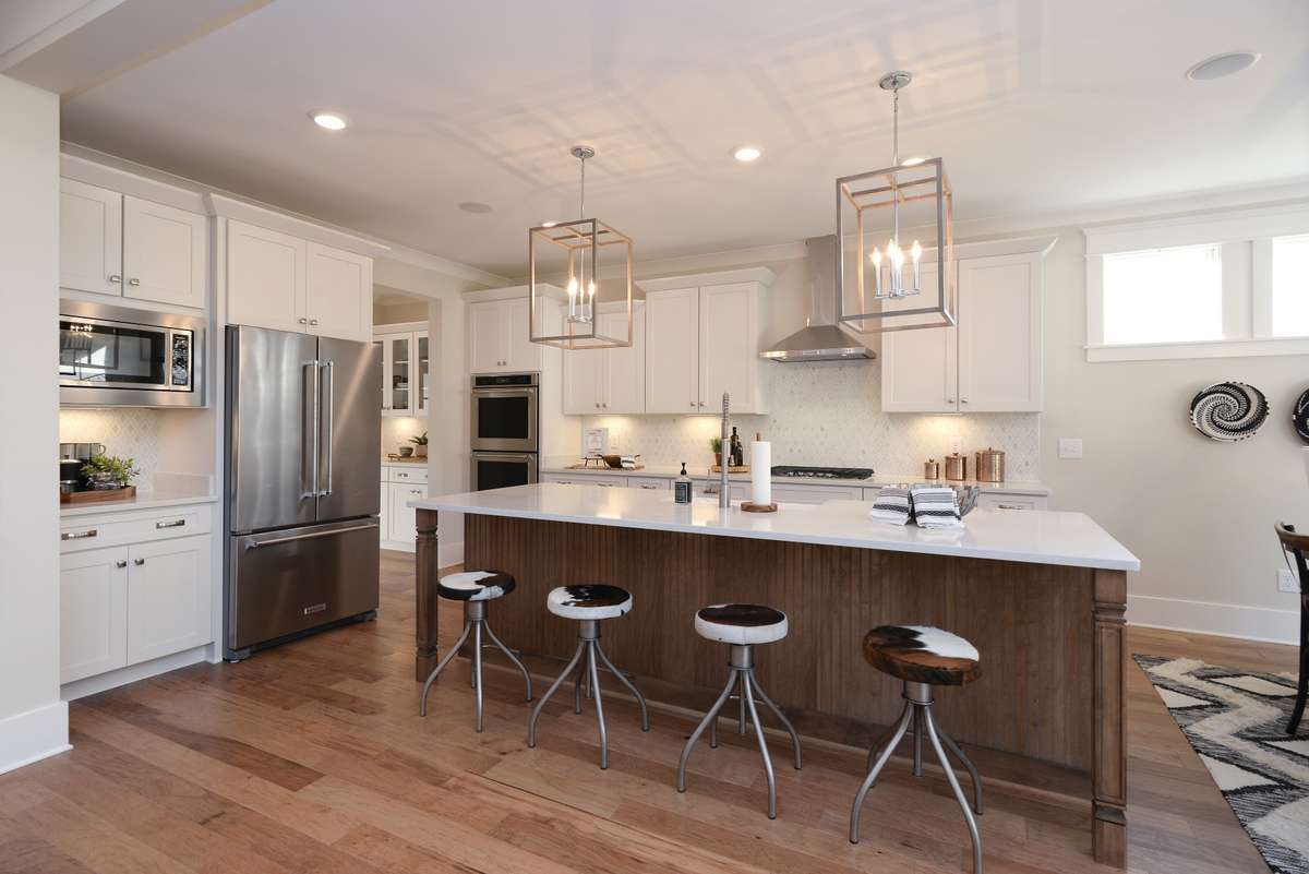 Photos are from another home with the same plan and are for representative purposes only.  Exterior and interior selections and upgrades may vary.