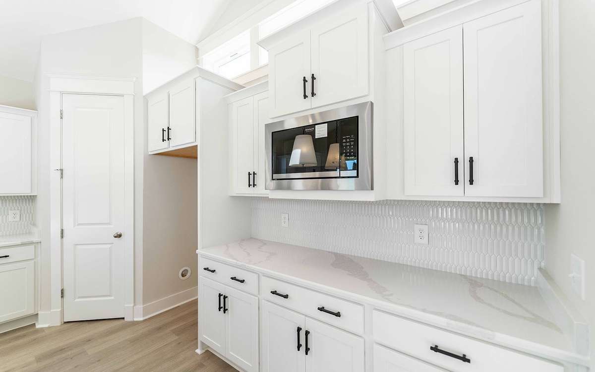 Photos are from another home with the same plan and are for representative purposes only.  Exterior and interior selections and upgrades may vary.