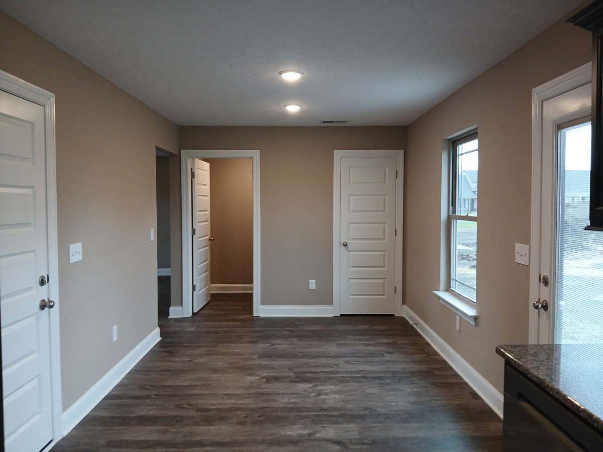 Kitchen and Dining Area with LV Plank Flooring.