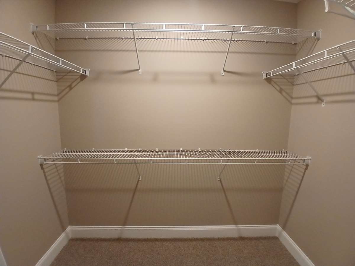 Large Walkin Closet in Owner's Suite.  Picture of Previous House.