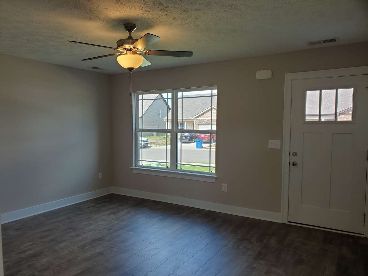 Lot 116 Valley Farms has a Ceiling Fan and Double windows in the Living Room.
Picture of Previous House.