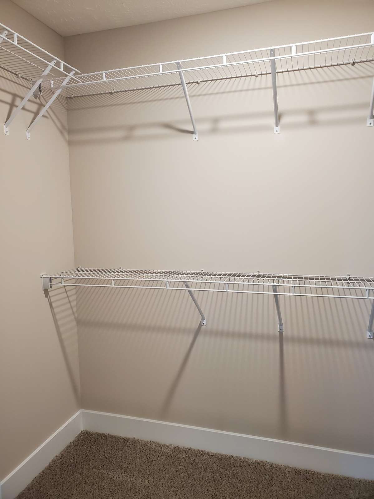 Spacious Walk-In Closet offers Extra Storage Space.  Previous House is shown.