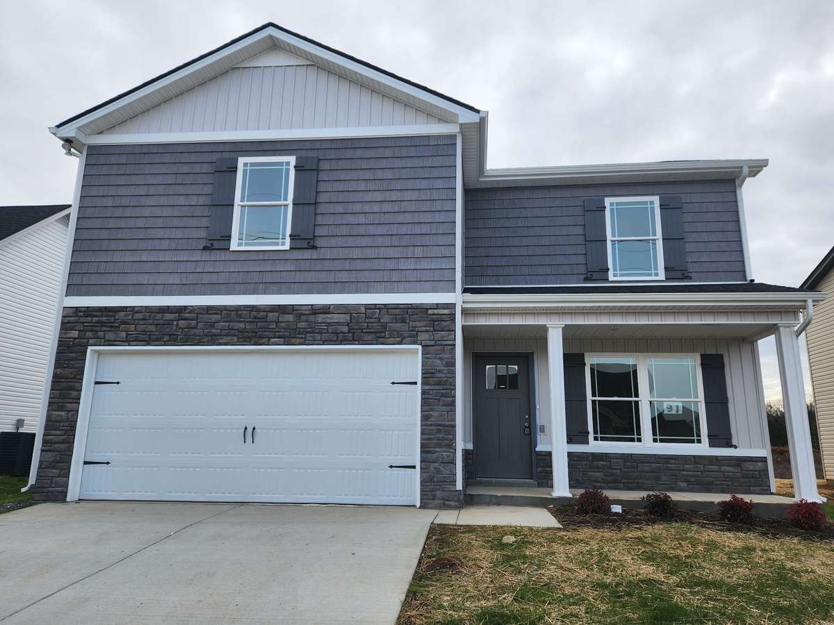 Lot 147 has a Covered Front Porch for Welcoming Family & Friends. 
Picture of Previous House.