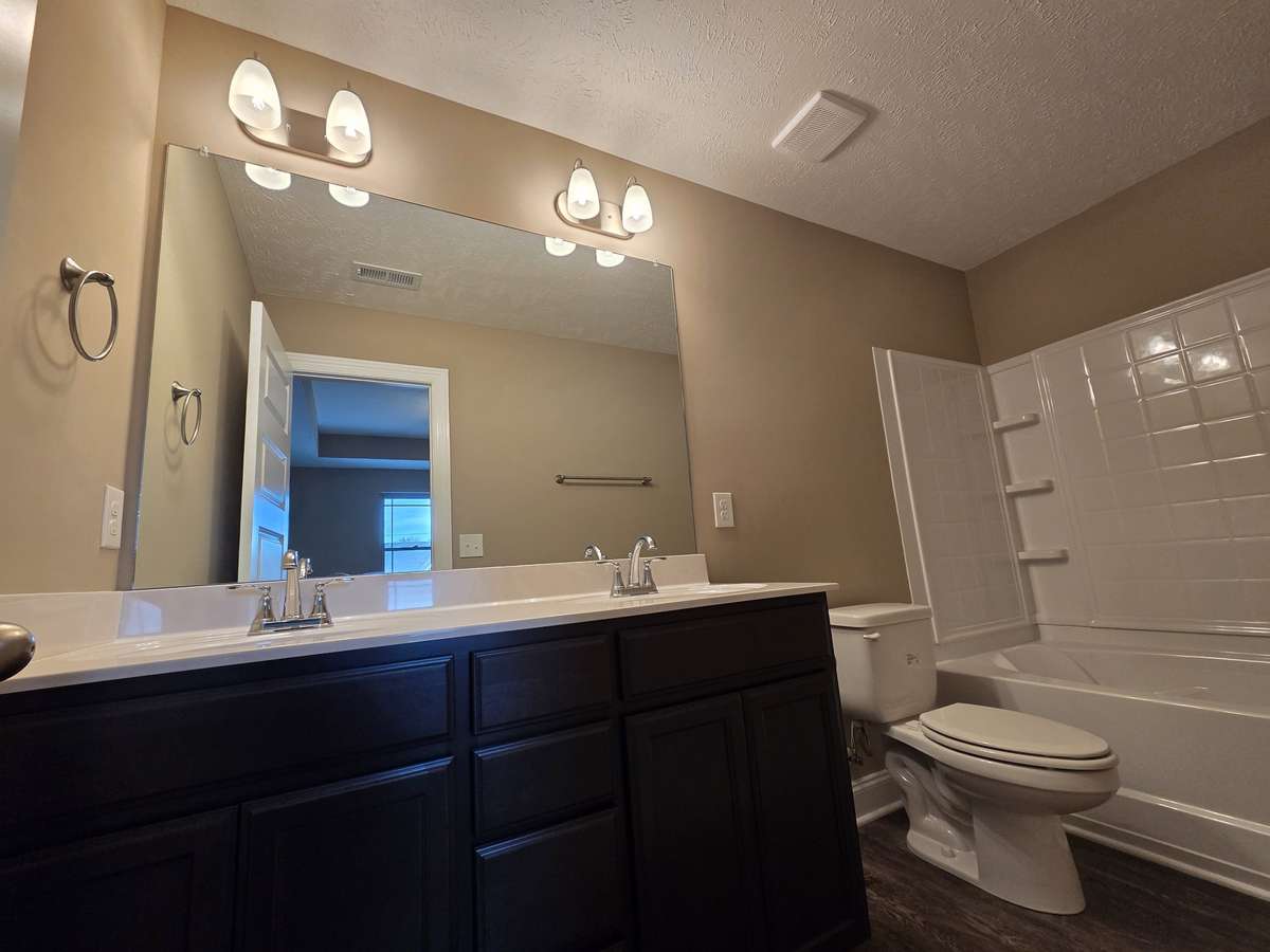 Custom Cabinet with Double Sinks in Primary Bath.
