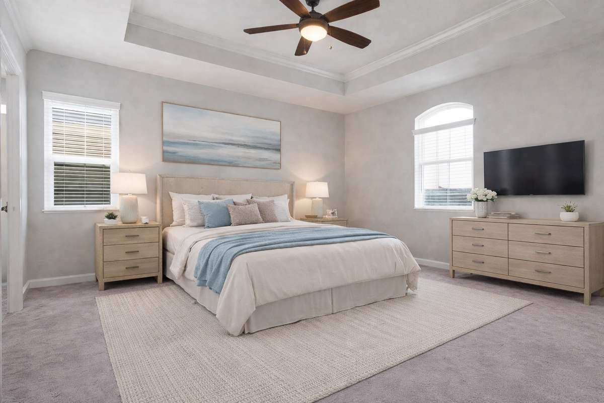 *Virtually staged Primary bedroom with tray ceiling.