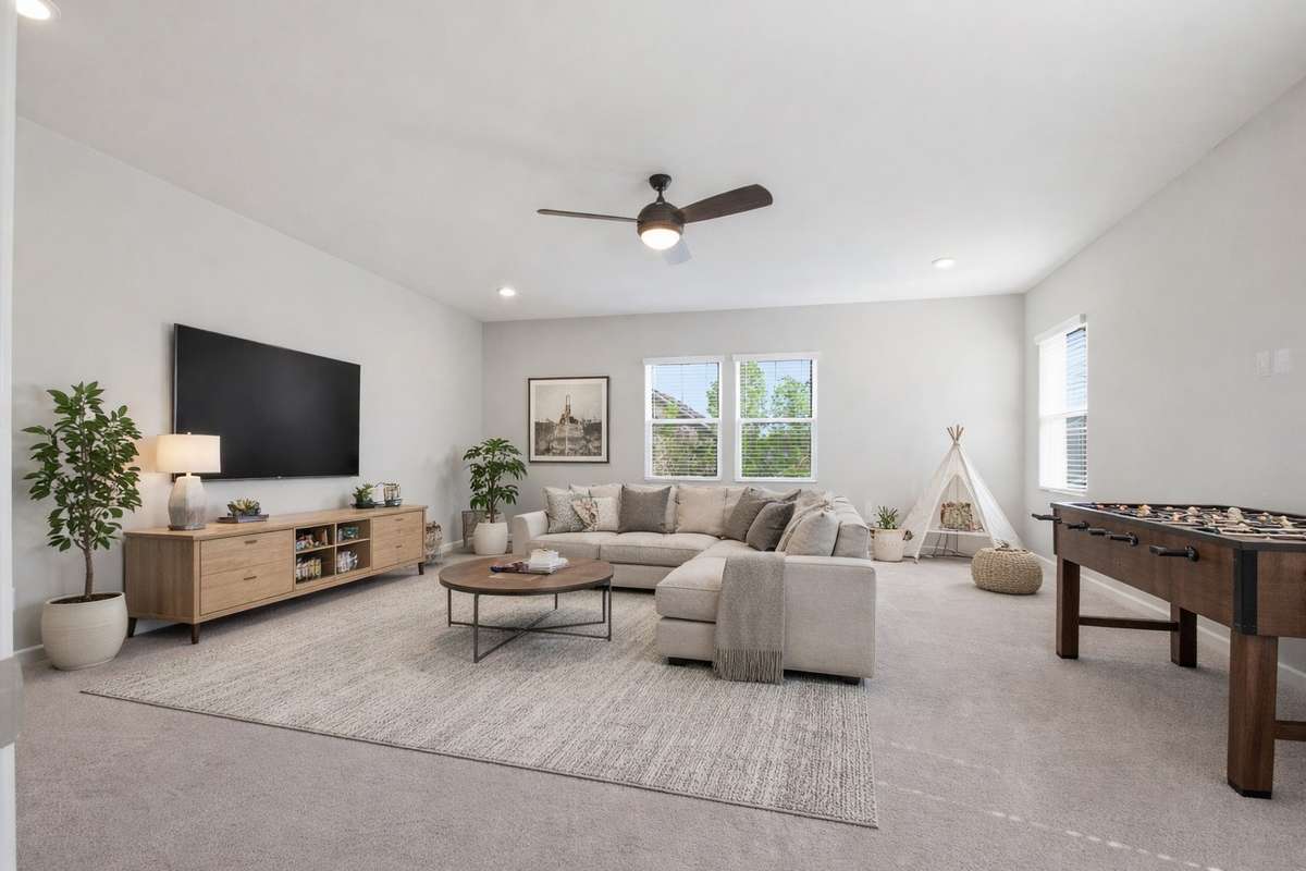 The upstairs bonus room has been virtually staged to help envision what it could be!