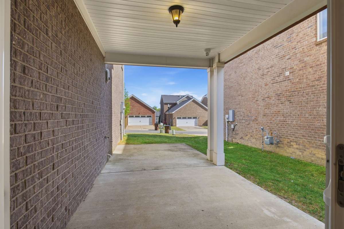 This is the covered side patio ready for your outdoor enjoyment.