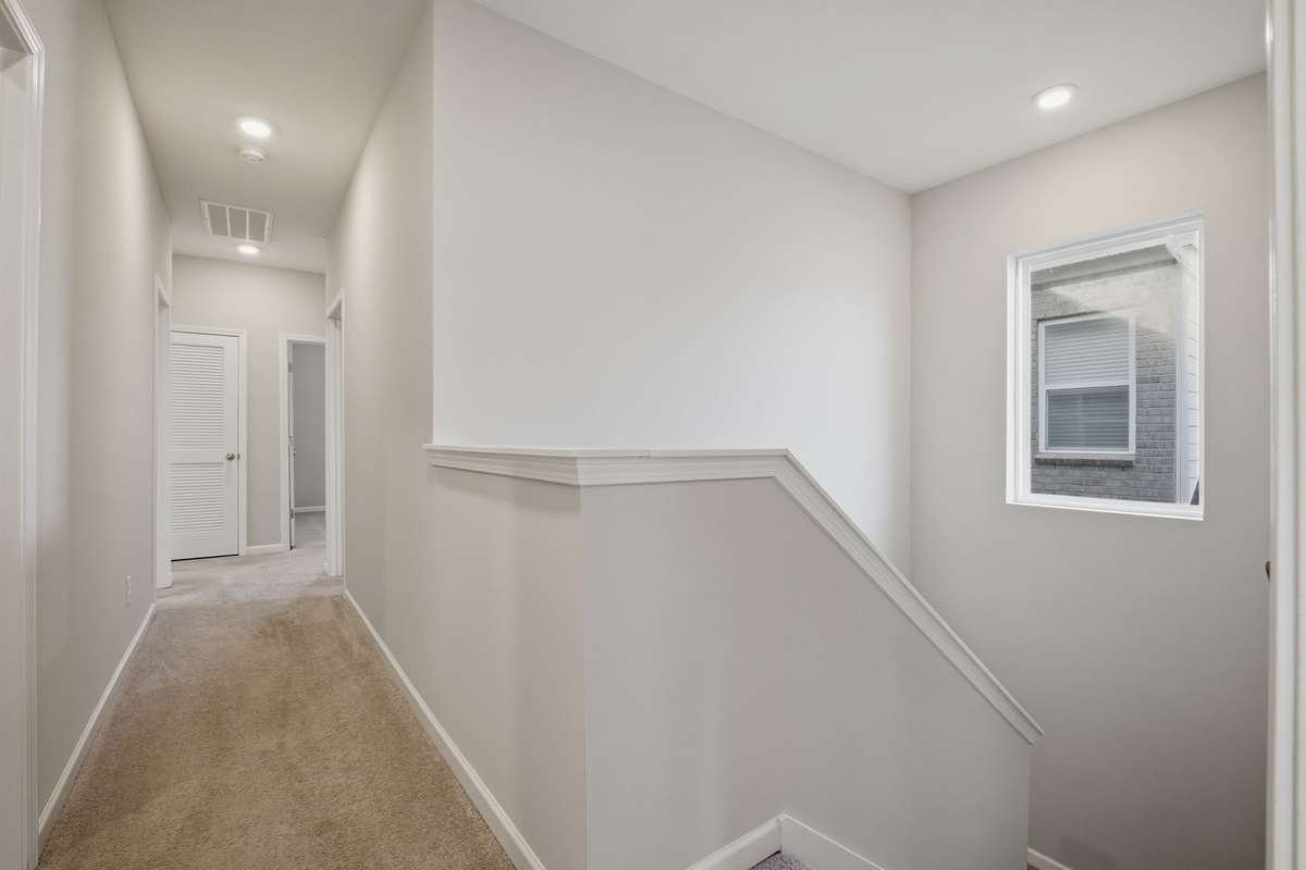 The window in the upstairs hallway lets in great light.