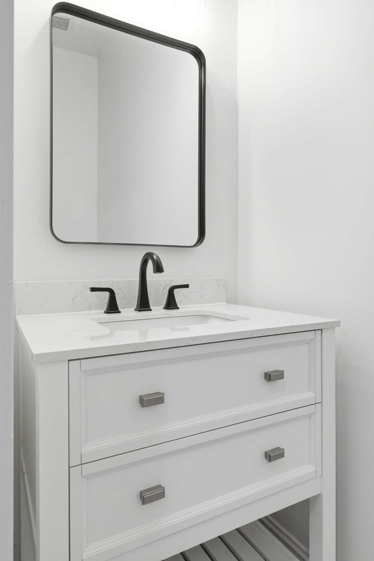 Half bathroom downstairs.