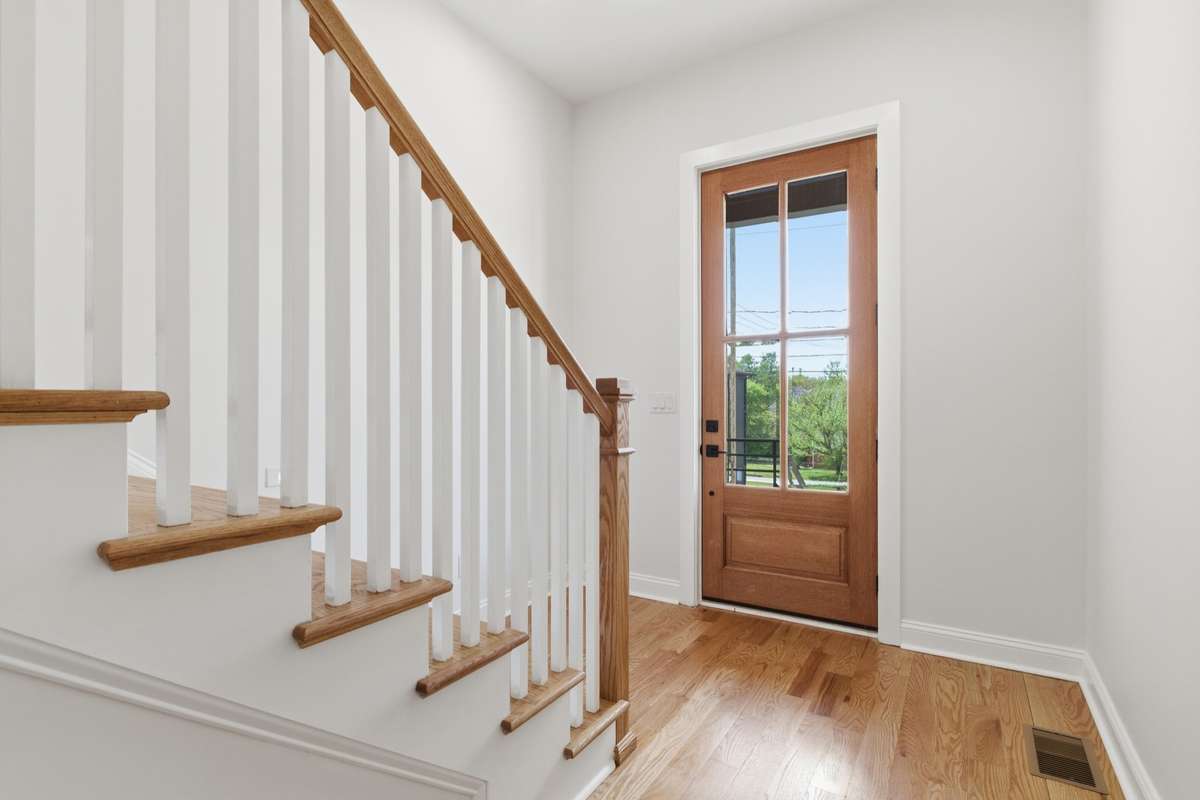 Red oak flooring throughout.