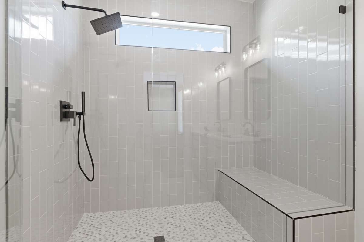 Large Tiled Shower with Frameless Glass