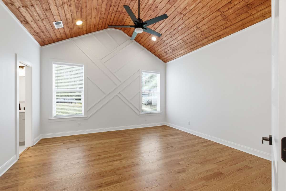 Owner's Suite with Vaulted Beadboard Ceiling.