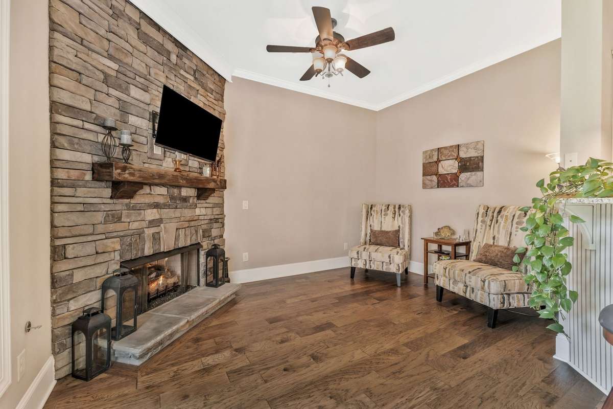 Fireplace room next to kitchen