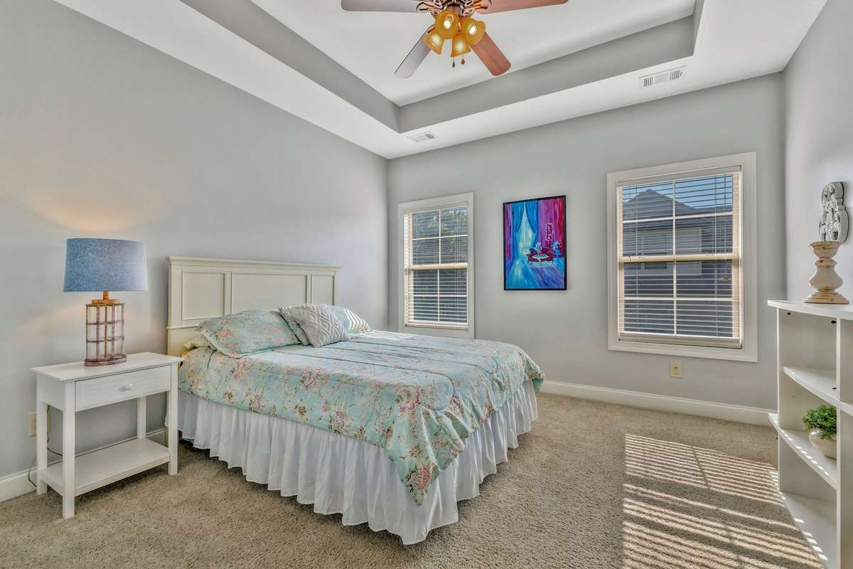 Another upstairs bedroom with walk-in closet