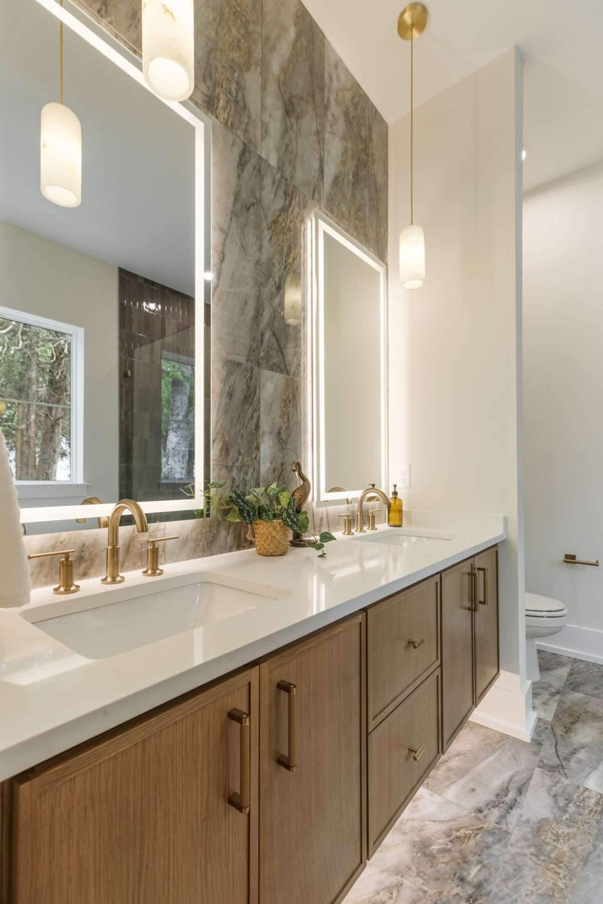 Double Vanity, Alabaster Lights and LED Mirrors.
