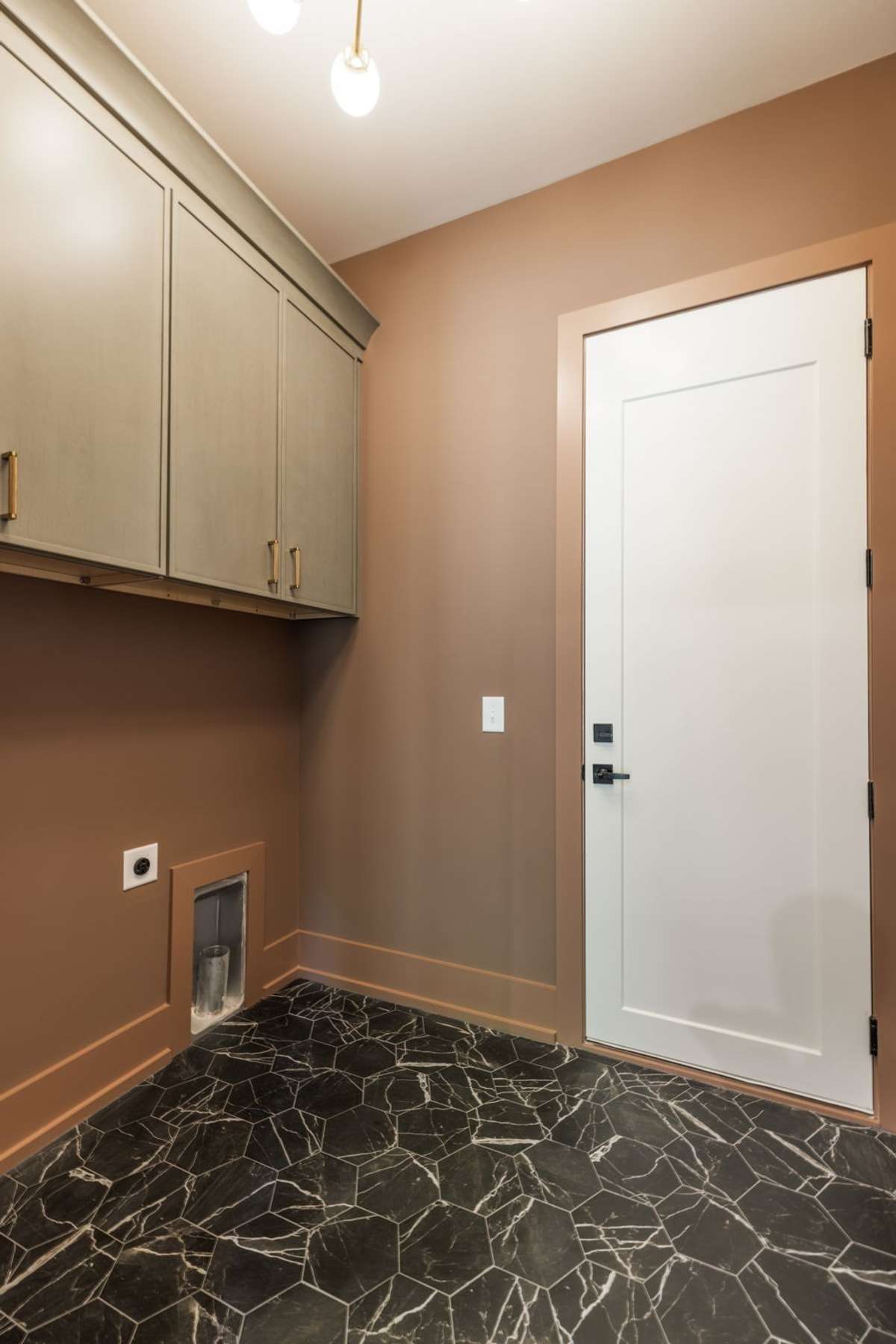 Laundry Room with garage access.
