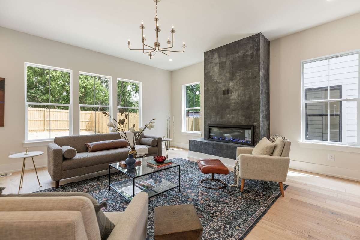 Living Room with Electric Fireplace and Venetian Glaze.