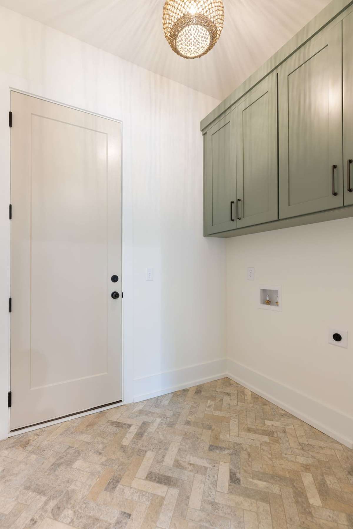 Laundry Room with access to Garage.