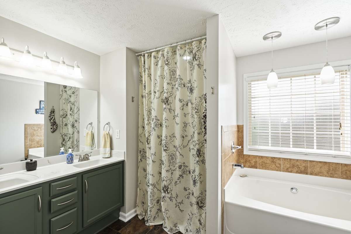 Double vanities and separate shower and bath