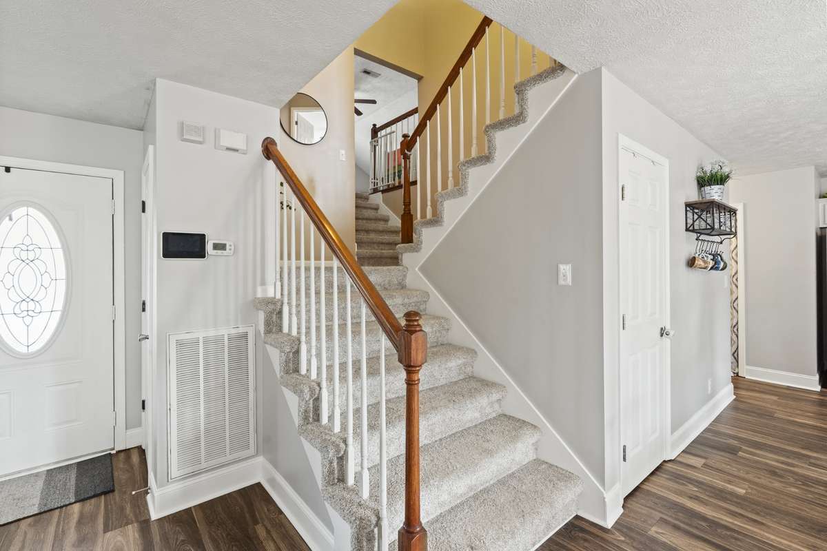 Inviting open floor plan. Stairs are extra wide